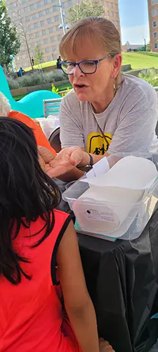 The volunteers participate in events to carry the message of the Gospel to children through CEF Midland Basin. 